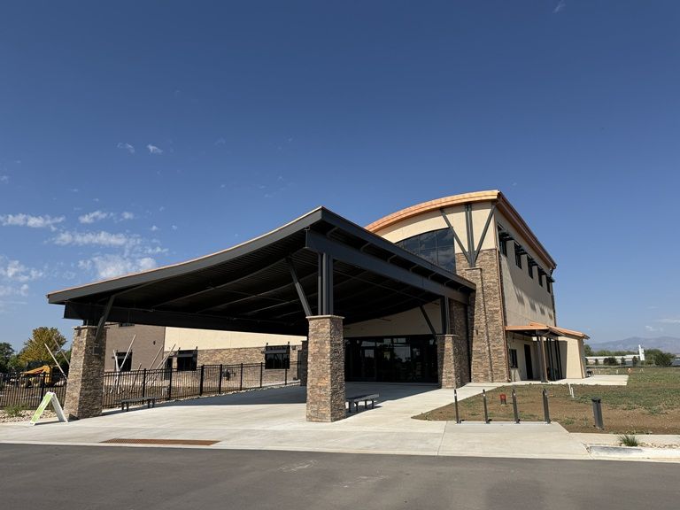 Loveland Nazarene Stillwater Church front sweeping curved canopy